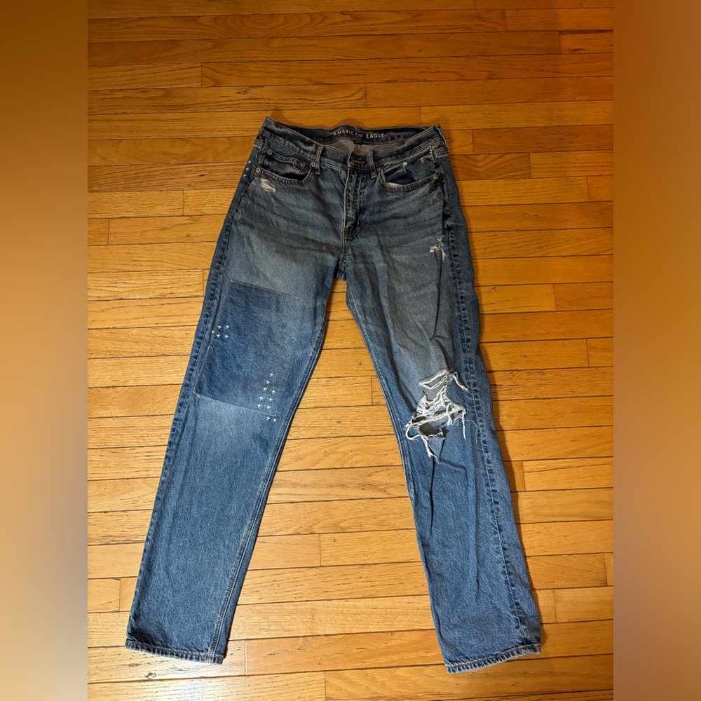 Distressed jeans.